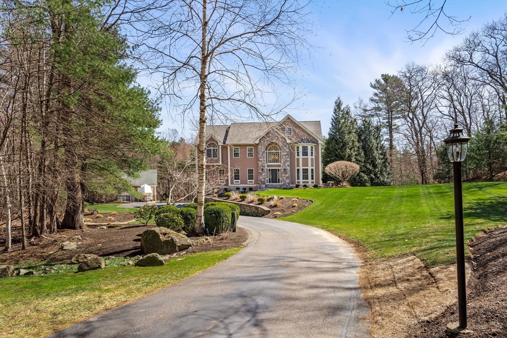 10 Sawyer Lane Middleton, MA 01949 - Photo 9 of 46 a view of a park with large trees