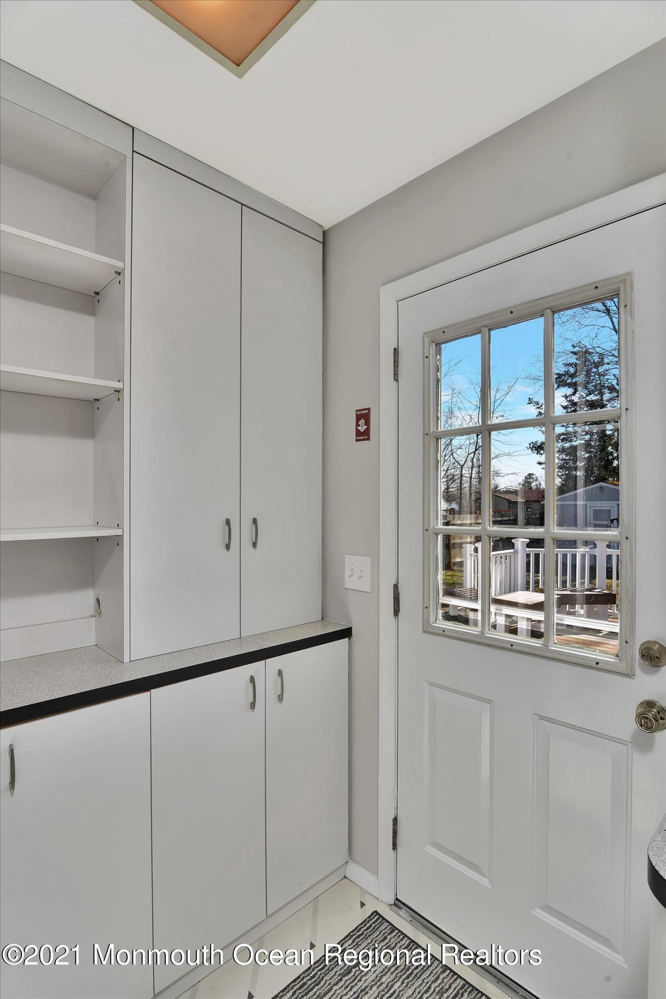 56 Burnt Tavern Road Brick, NJ 08724 - Photo 9 of 27 Kitchen door to deck