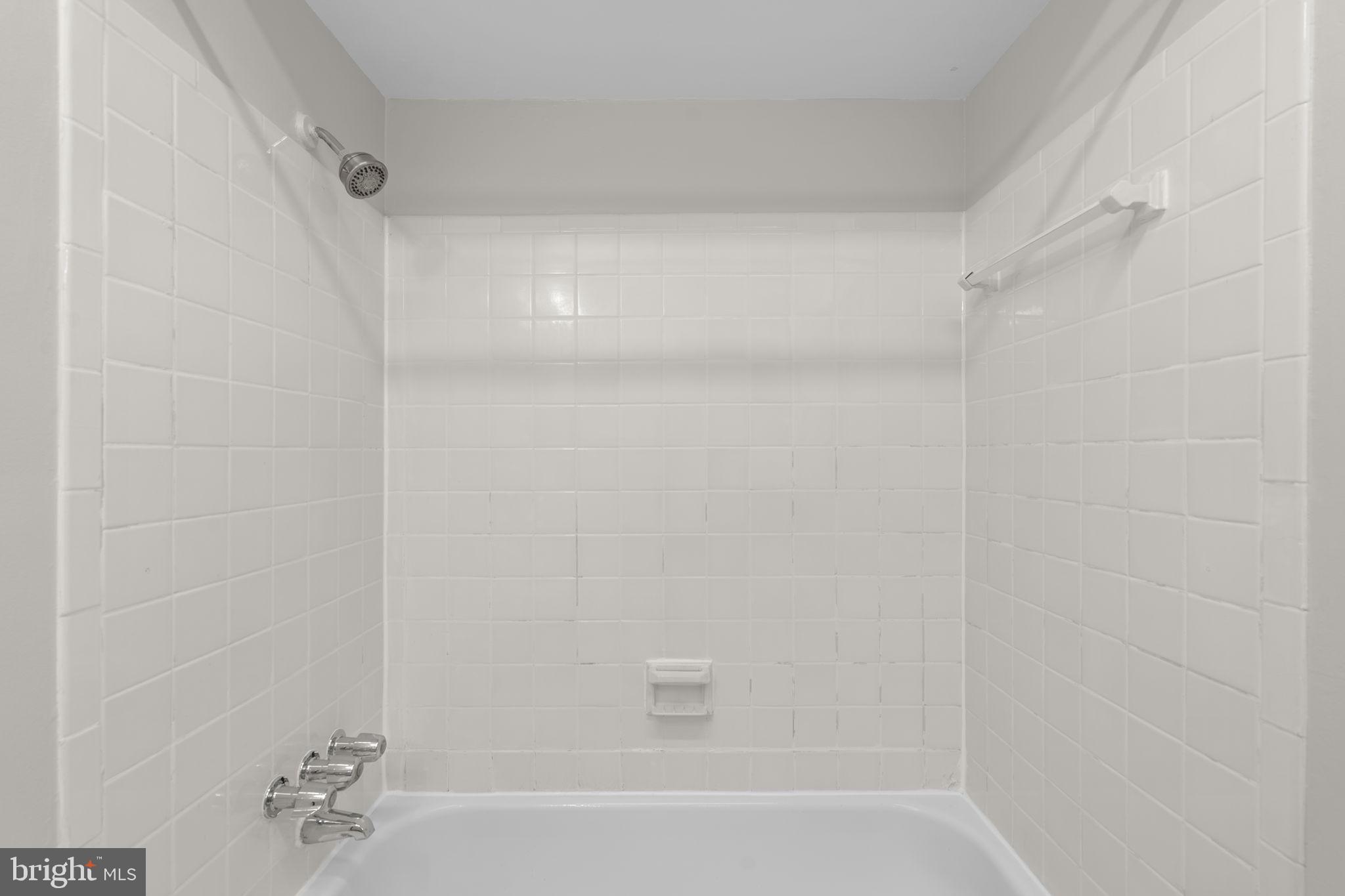 8221 Tory Road, Unit 150 Springfield, VA 22152 - Photo 23 of 36 Sleek and modern bathroom retreat.