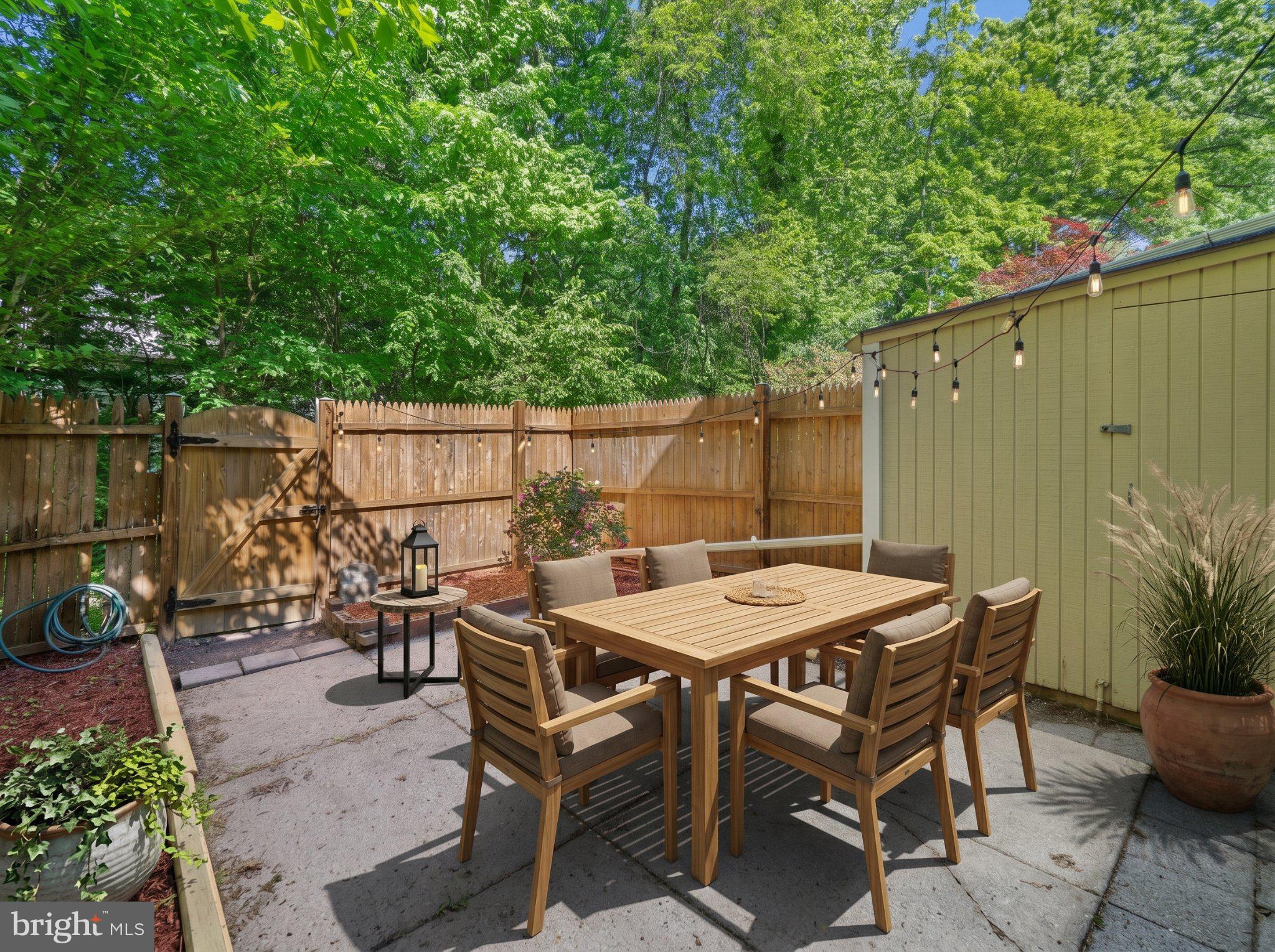 8221 Tory Road, Unit 150 Springfield, VA 22152 - Photo 31 of 36 Serene outdoor dining oasis awaits.