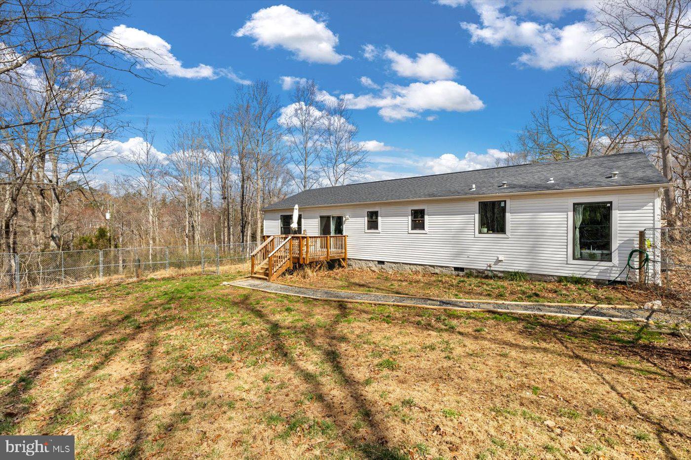 6122 Slate Mills Road Boston, VA 22713 - Photo 33 of 36 a view of a house with backyard and trees