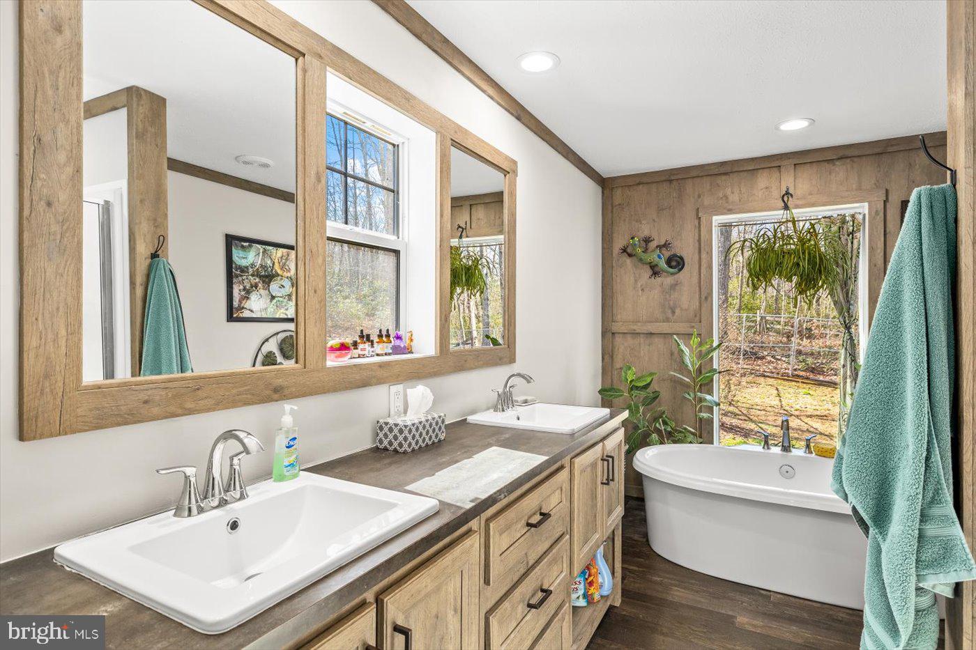 6122 Slate Mills Road Boston, VA 22713 - Photo 8 of 36 a bathroom with a sink double vanity and a bathtub