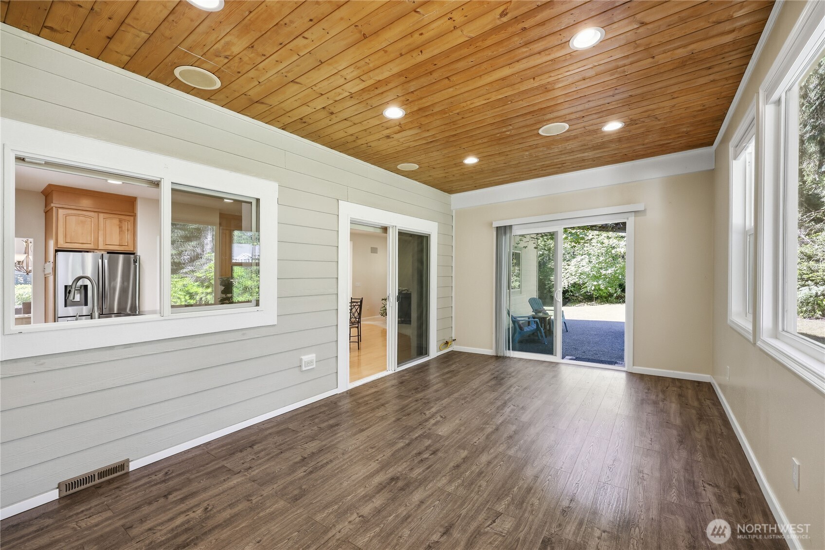 4354 Northwest Westgate Road Silverdale, WA 98383 - Photo 11 of 40 a view of livingroom with furniture wooden floor and windows