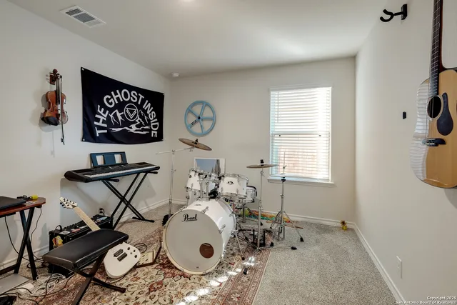 a very nice looking room with a table and chairs