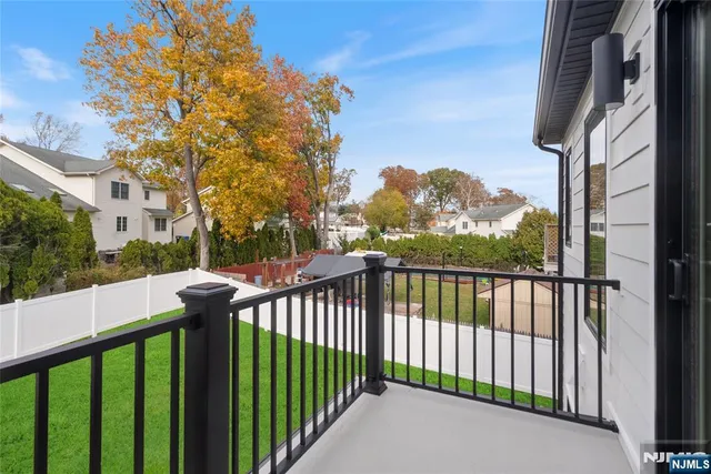 a view of a porch with a floor to ceiling window