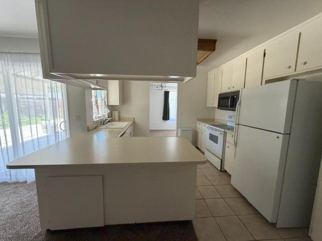 2601 Temperate Court Modesto, CA 95358 - Photo 11 of 24 a view of a kitchen with electric appliances