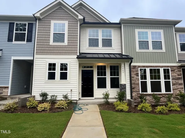 a potted plant sitting in front of a building