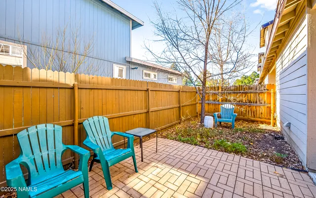 a view of a chairs setting on the deck