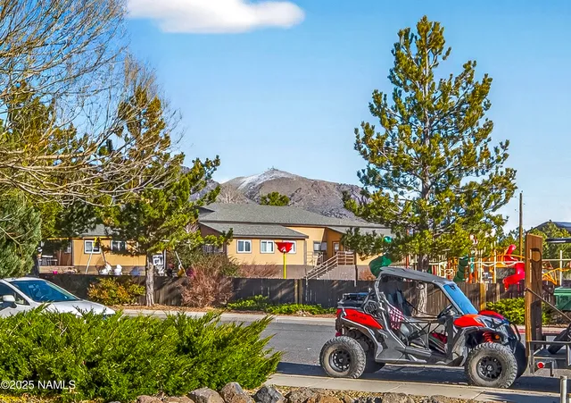 a car parked in front of a house