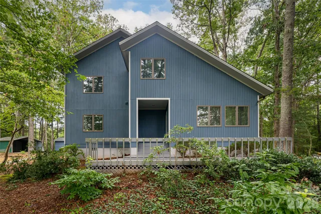 a front view of a house with yard