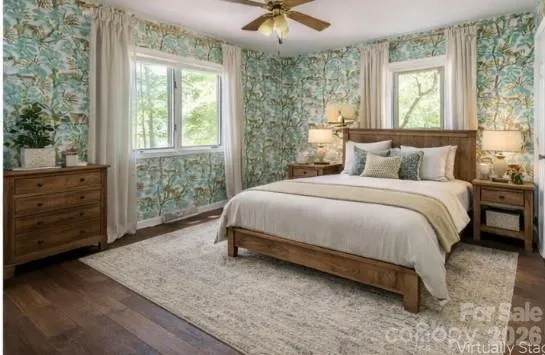 a bedroom with a bed and window