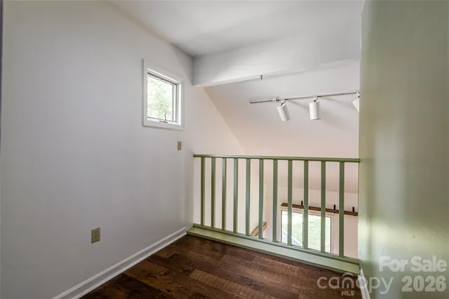 a view of entryway with wooden floor