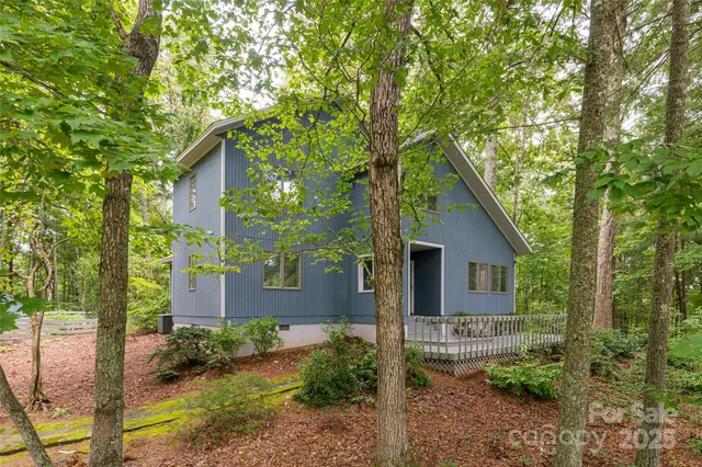 a house view with a backyard space