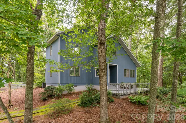 a house view with a backyard space
