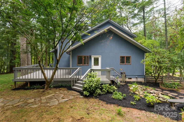 a view of balcony and yard