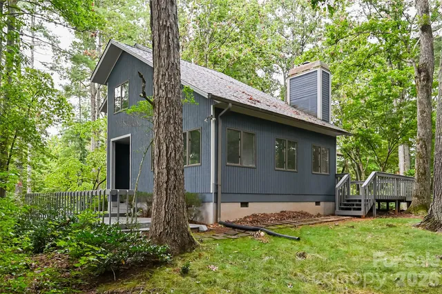 a front view of house with yard and seating area