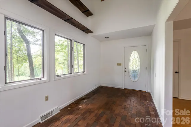 an empty room with window