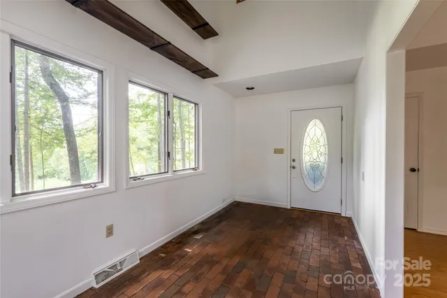 an empty room with window