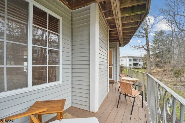 a view of balcony with furniture