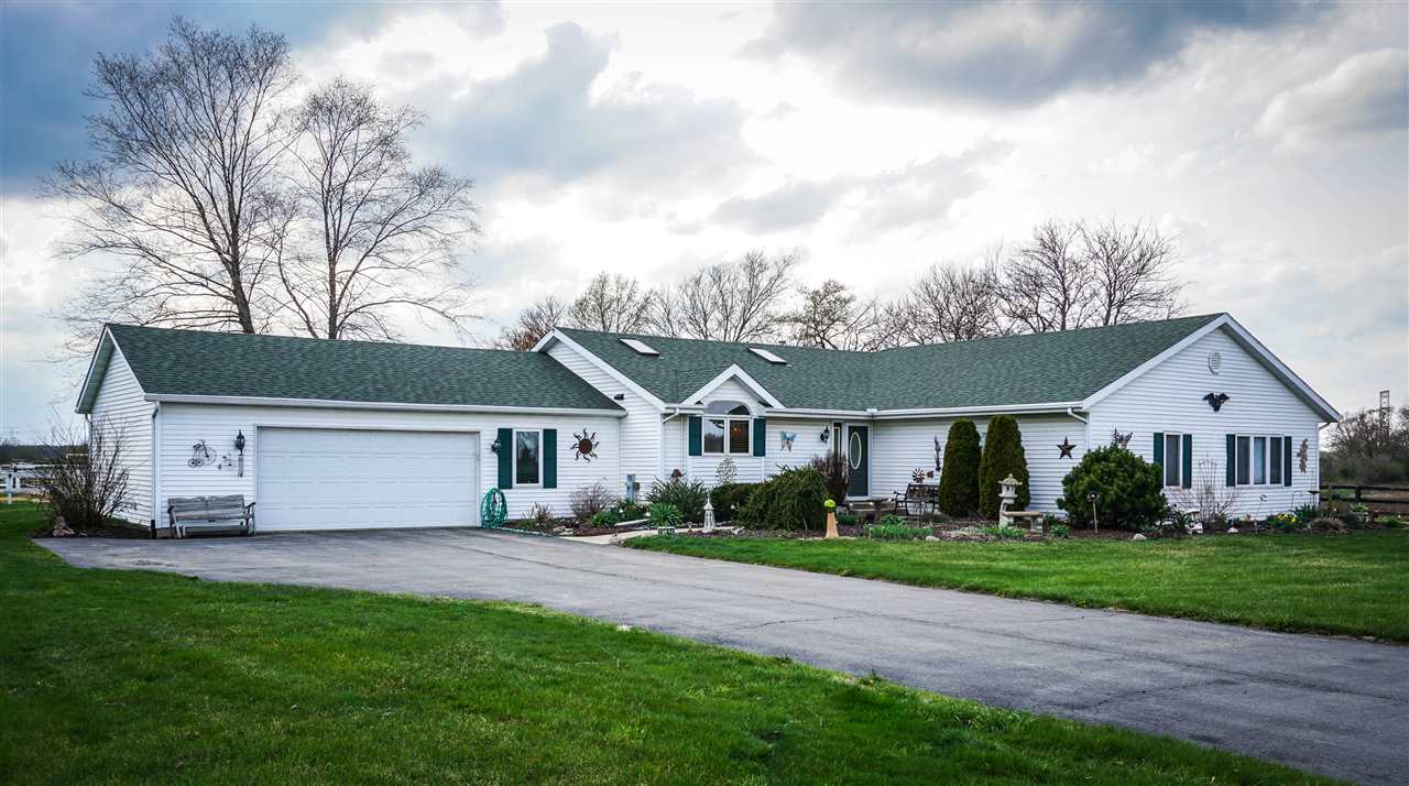 4545 River Road Cherry Valley, IL 61016 - Photo 2 of 25 a view of house with yard and green space