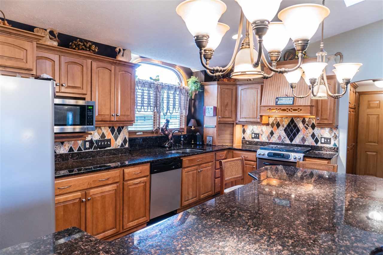 4545 River Road Cherry Valley, IL 61016 - Photo 9 of 25 a kitchen with lots of counter top space