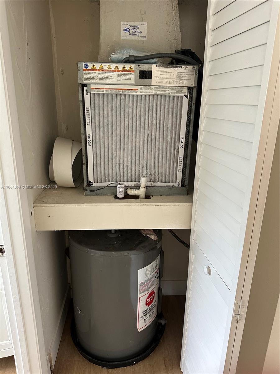 130 Northwest 60th Avenue, Unit 12 Margate, FL 33063 - Photo 14 of 16 a utility room with a sink