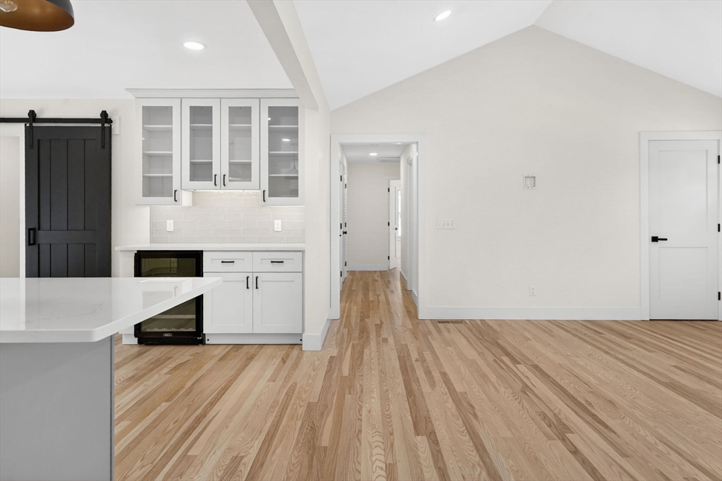 221 Cedar Swamp Road Monson, MA 01057 - Photo 11 of 37 a room with a bed and cabinets