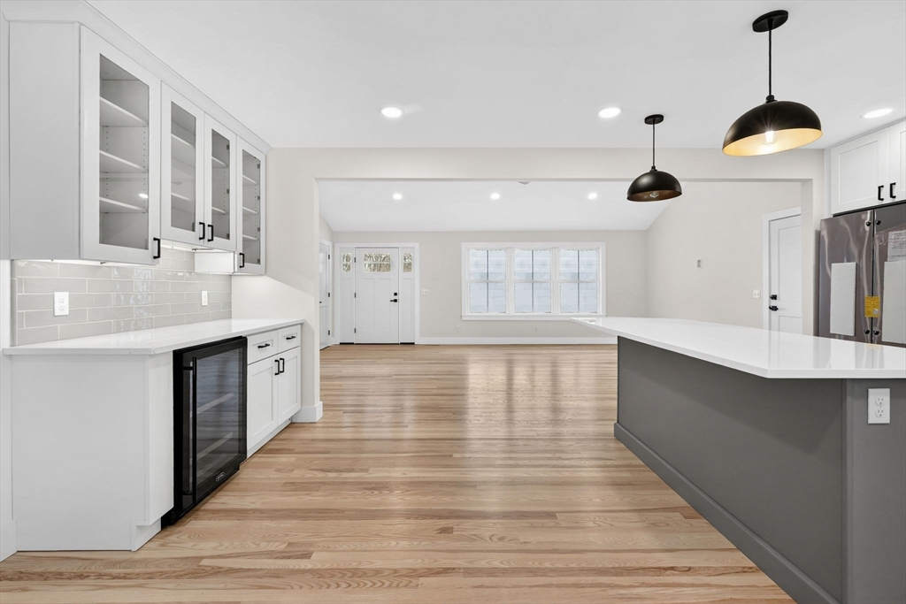 221 Cedar Swamp Road Monson, MA 01057 - Photo 20 of 37 a large kitchen with kitchen island a sink stainless steel appliances and cabinets