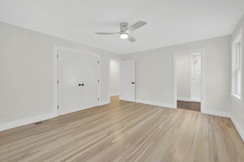 221 Cedar Swamp Road Monson, MA 01057 - Photo 24 of 37 a view of an empty room with wooden floor