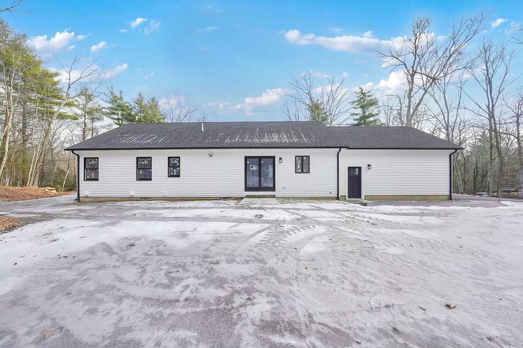 221 Cedar Swamp Road Monson, MA 01057 - Photo 31 of 37 a view of a house with a backyard and a tree