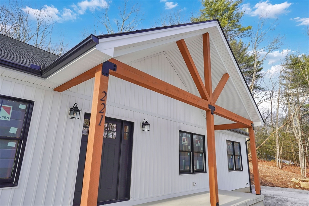 221 Cedar Swamp Road Monson, MA 01057 - Photo 4 of 37 a view of a house with a door