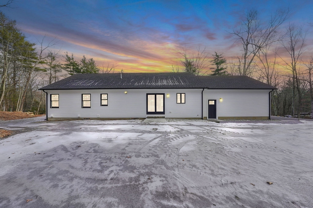 221 Cedar Swamp Road Monson, MA 01057 - Photo 8 of 37 front view of a house with a dry yard