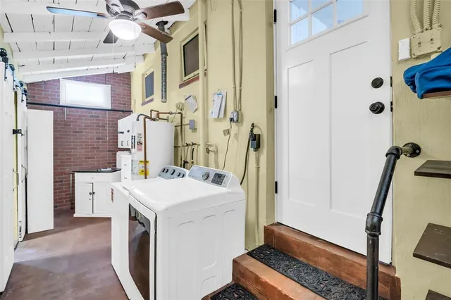 a utility room with dryer and washer