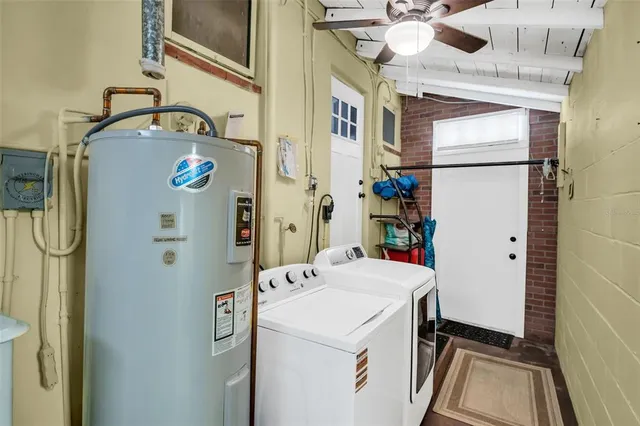 a utility room with dryer and washer