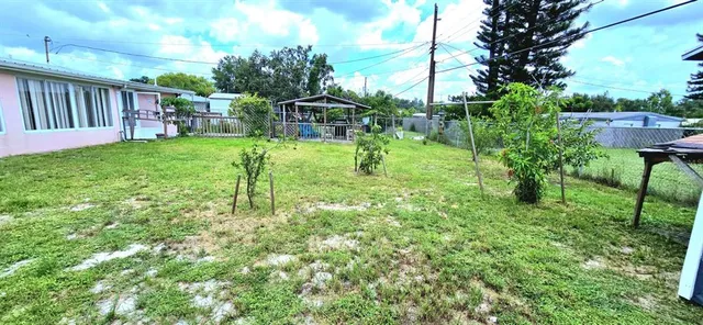 a garden view with a seating space