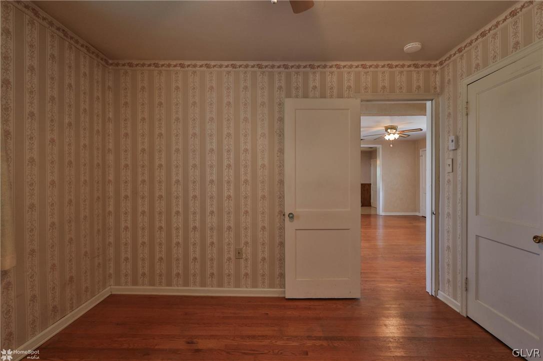 1215 Macada Road Bethlehem, PA 18017 - Photo 15 of 39 a view of empty room with wooden floor