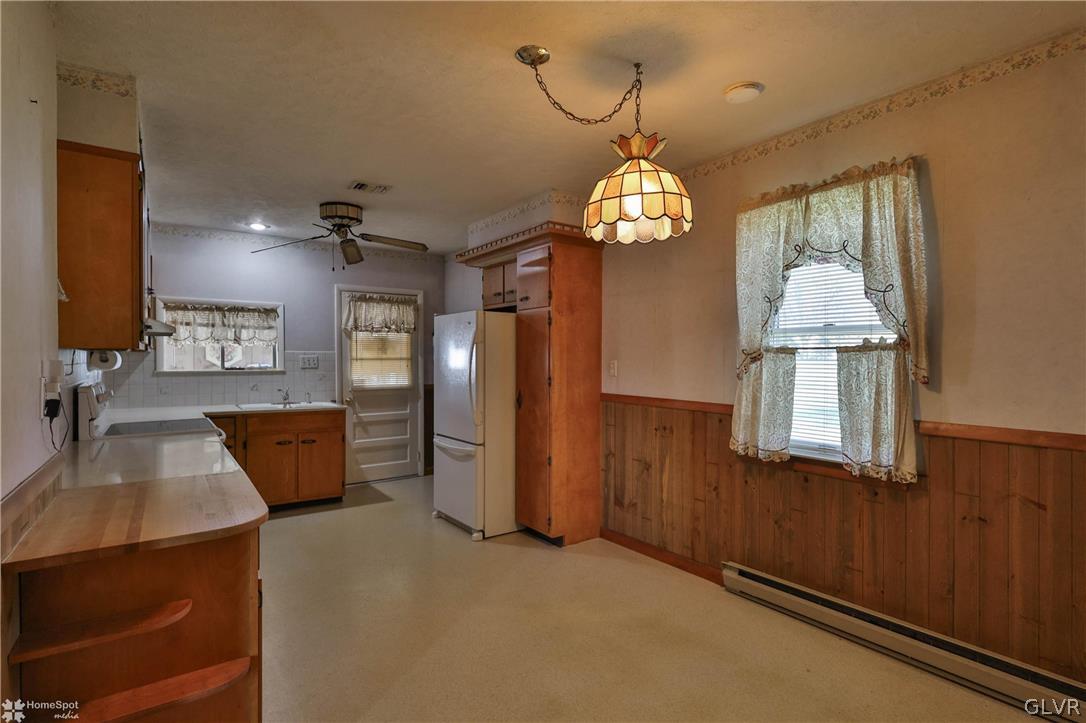 1215 Macada Road Bethlehem, PA 18017 - Photo 17 of 39 a view of a room with a chandelier furniture and windows