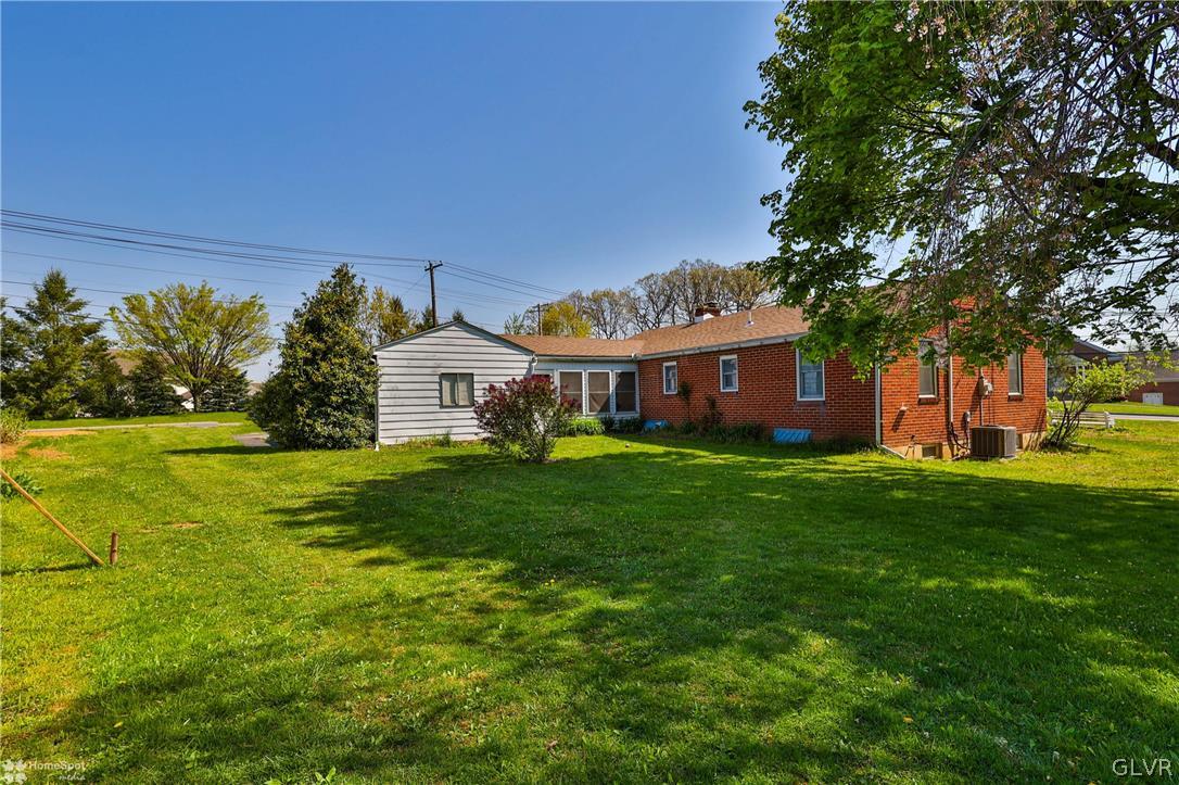 1215 Macada Road Bethlehem, PA 18017 - Photo 2 of 39 a front view of a house with garden