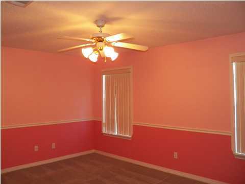 725 Riva Ridge Drive Crestview, FL 32539 - Photo 8 of 22 a view of a room with window and ceiling fan