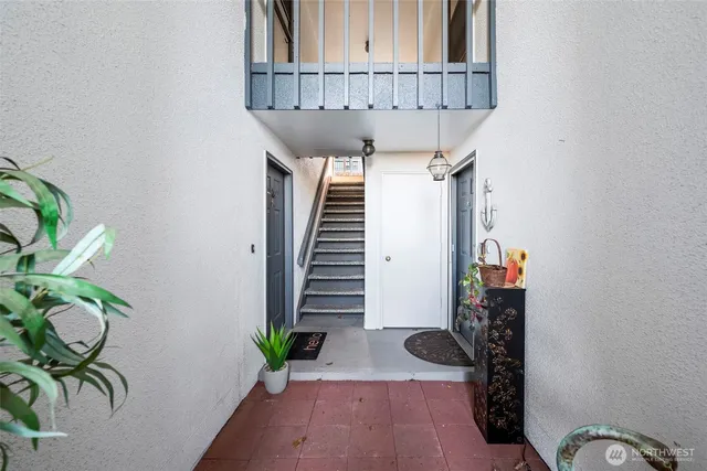 a view of entryway with wooden floor