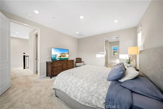 a large bathroom with a glass shower door