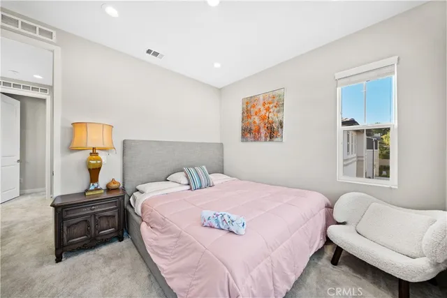 a bathroom with a sink double vanity and a shower