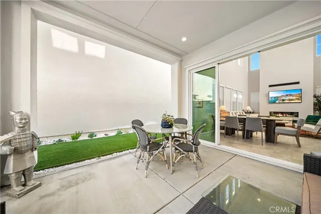 an aerial view of residential houses with city view