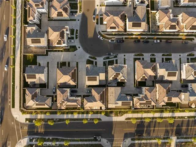 a view of a swimming pool with outdoor seating