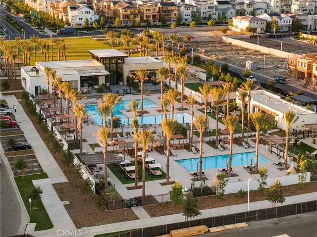 a large kitchen with a table and chairs