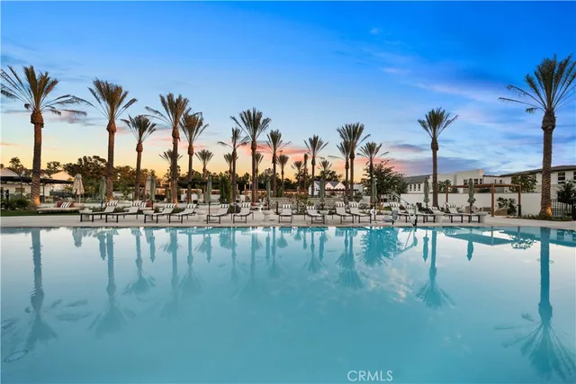 a view of a patio with a table and chairs