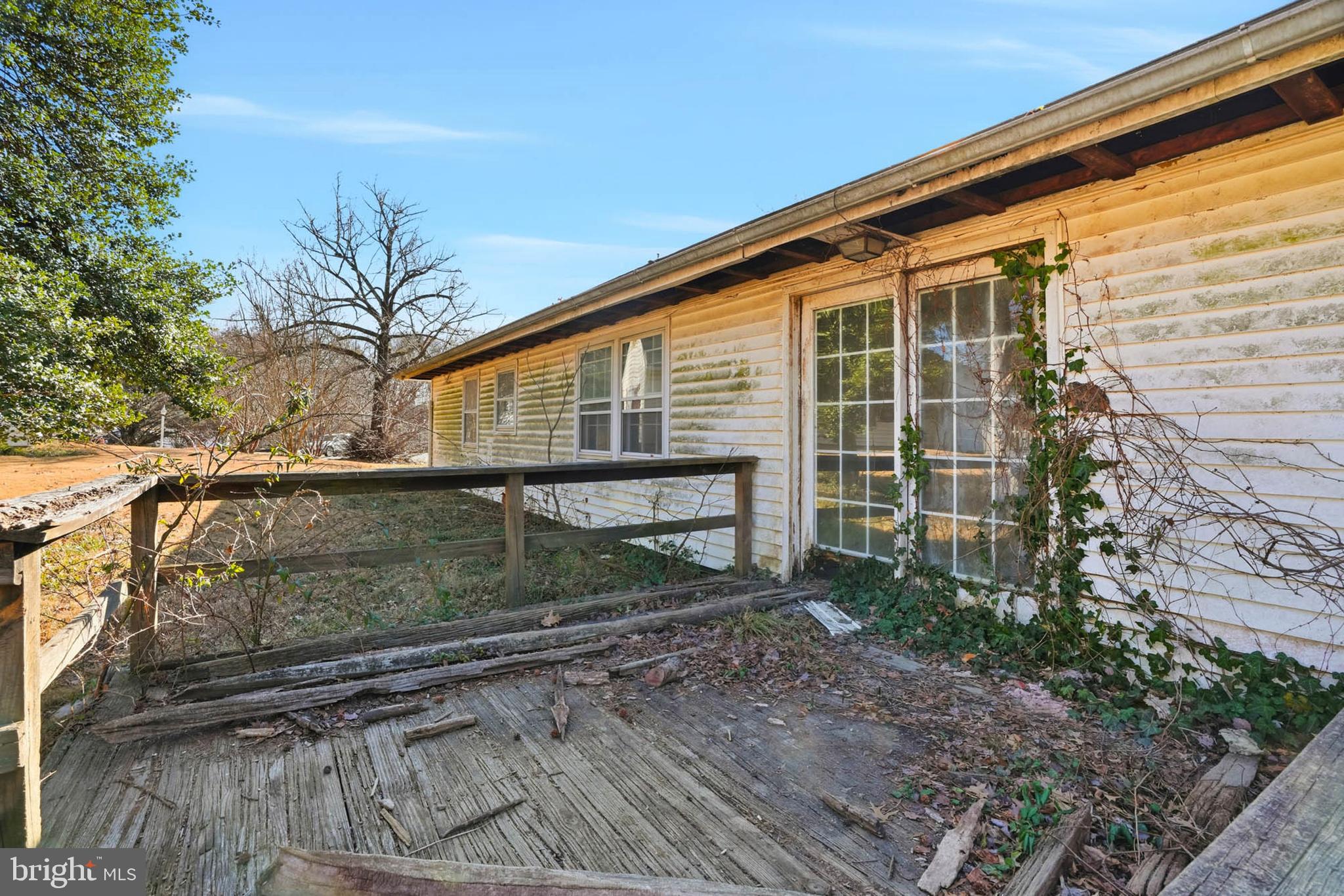 9200 Pleasant Court Laurel, MD 20708 - Photo 7 of 10 a front view of a house with a yard