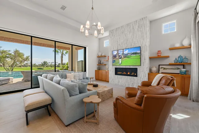 a bathroom with a double vanity sink window and a large mirror