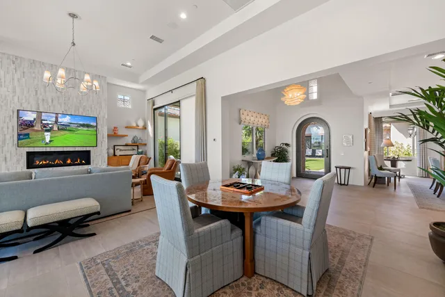 a kitchen with white cabinets and appliances