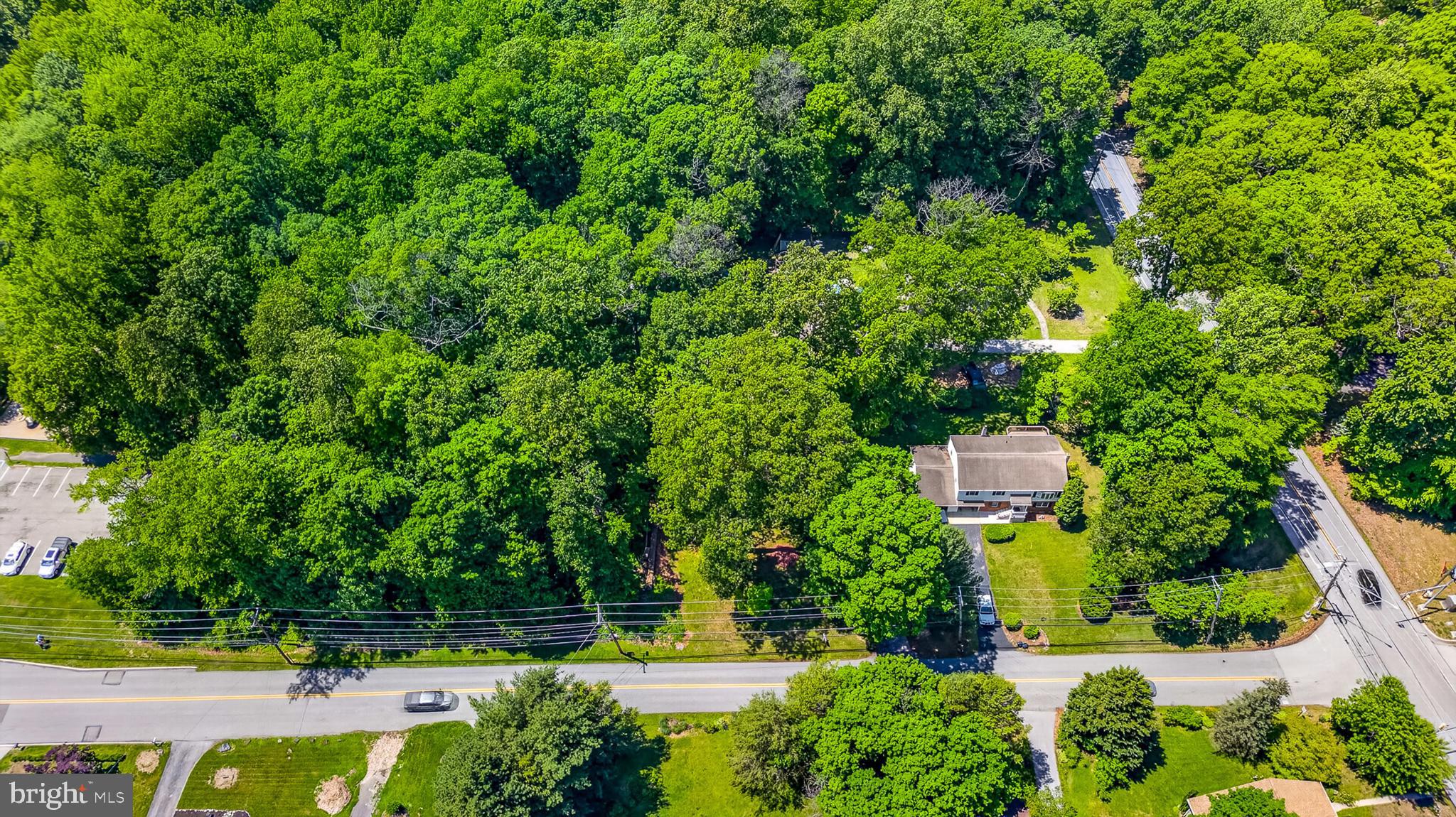 3701 Ebright Road Chadds Ford, PA 19317 - Photo 16 of 45 an aerial view of a house with a yard